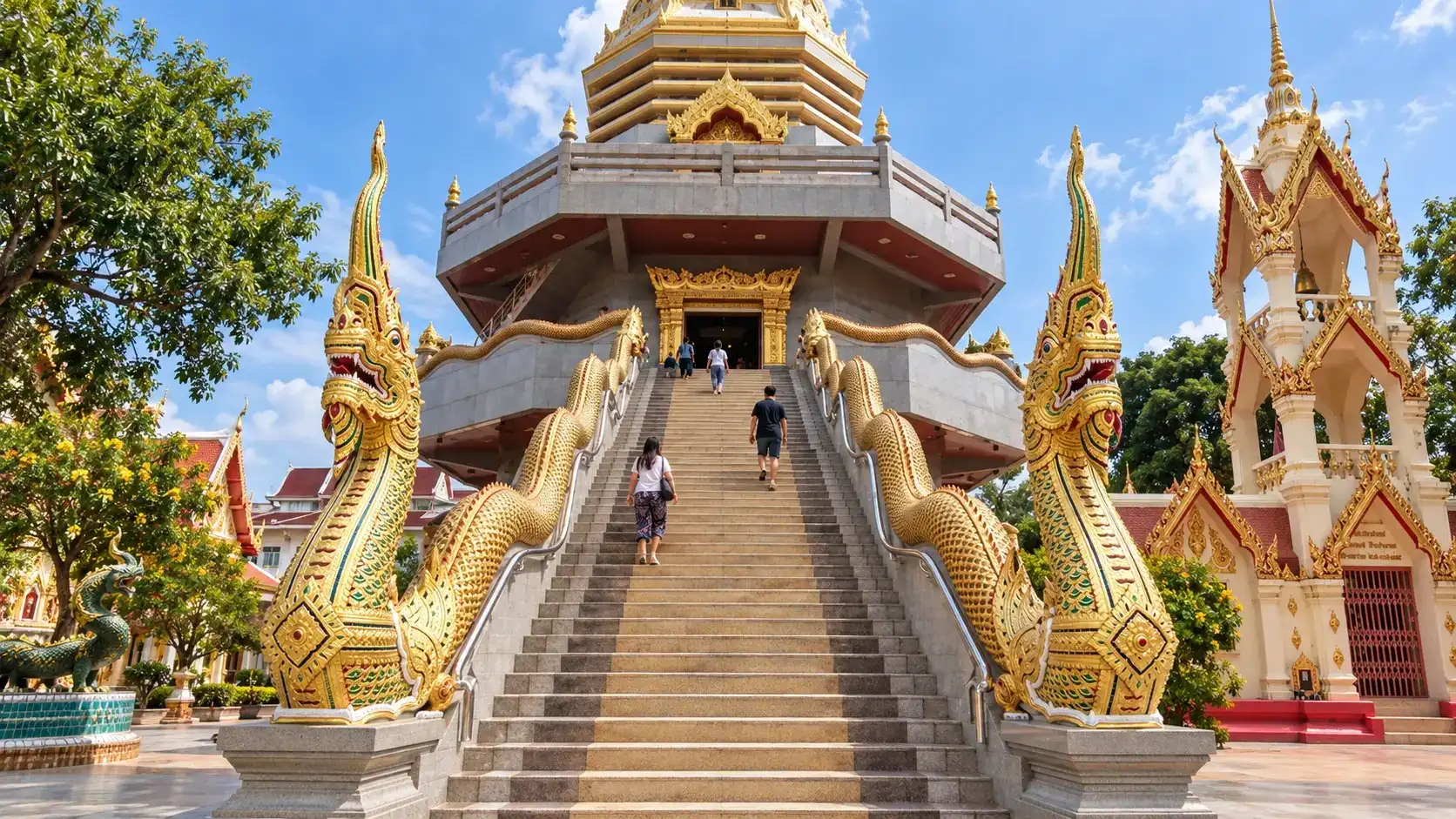 Golden Naga staircase leading to the central chedi at Wat Phothisomphon in Udon Thani