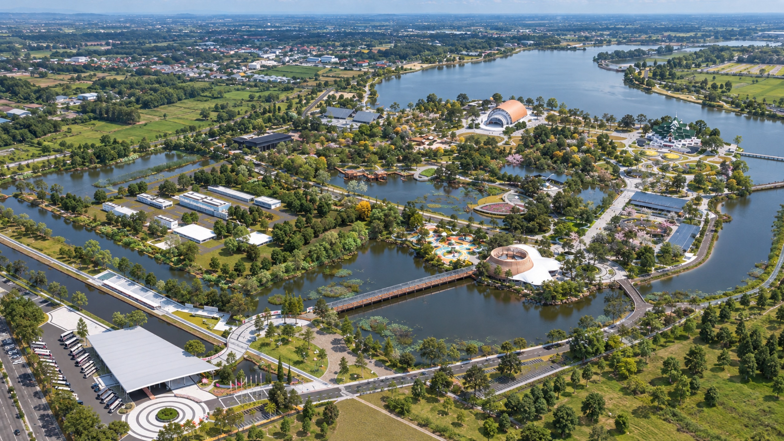 Aerial overview of the Udon Thani Expo 2026 wetland site with gardens, waterways and major buildings.