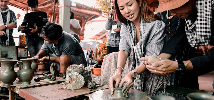 Tourists Learning Pottery