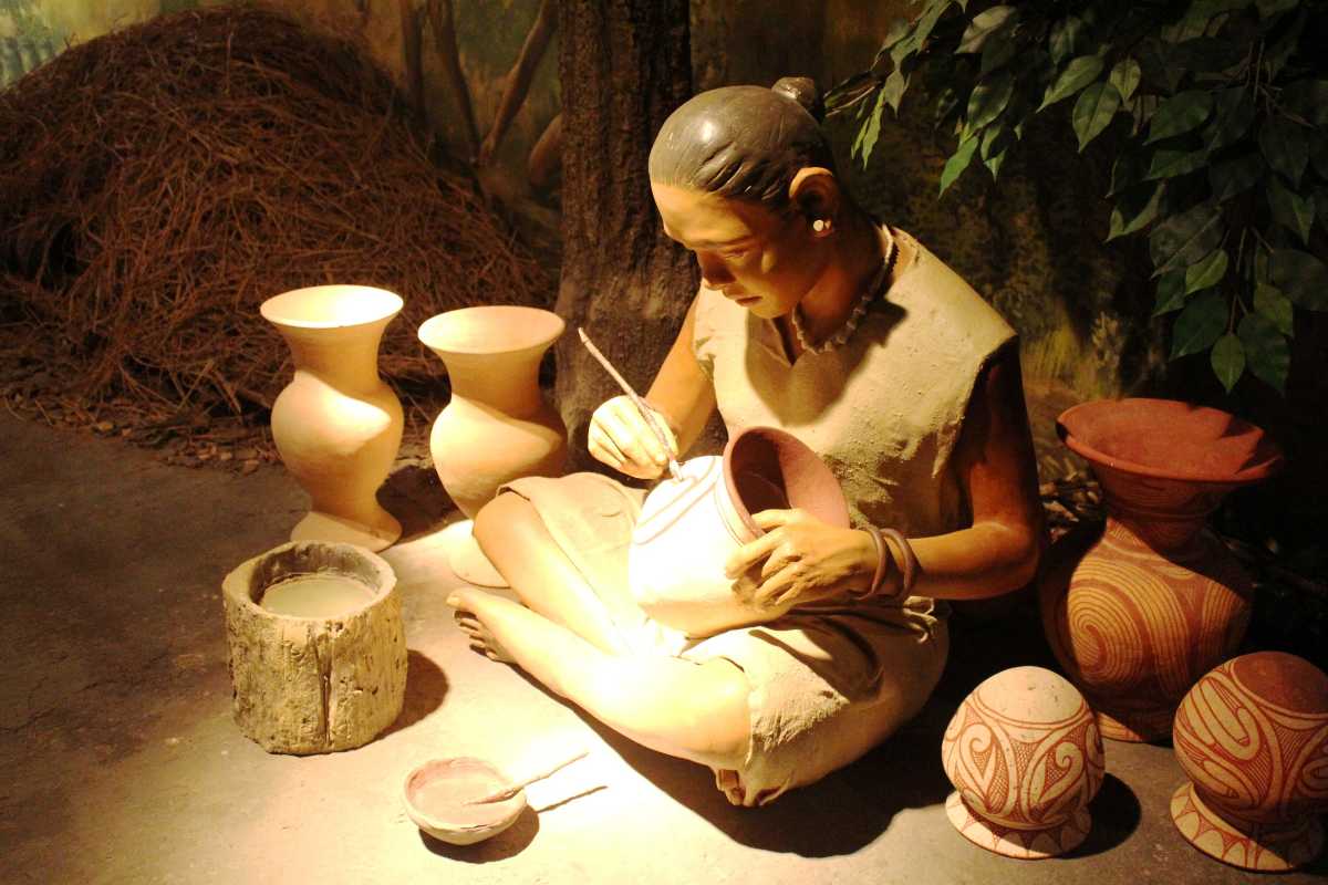 An Imagined Woman Making bronze Age Pots at Unesco Heritage ban Chiang