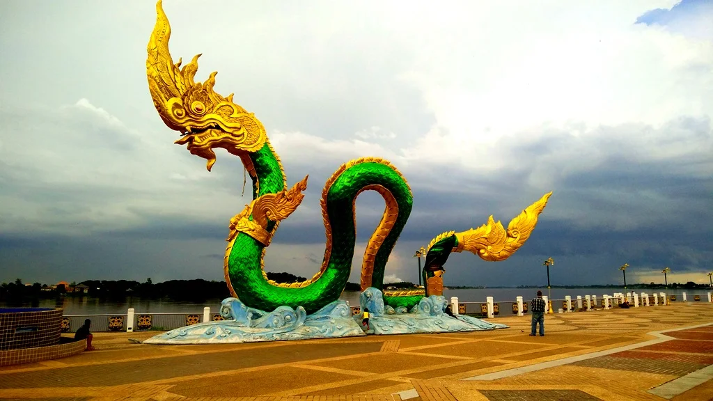 Phaya Naga statue along the Mekong River in Nong Khai, reflecting the region’s ongoing and thriving Naga worship traditions