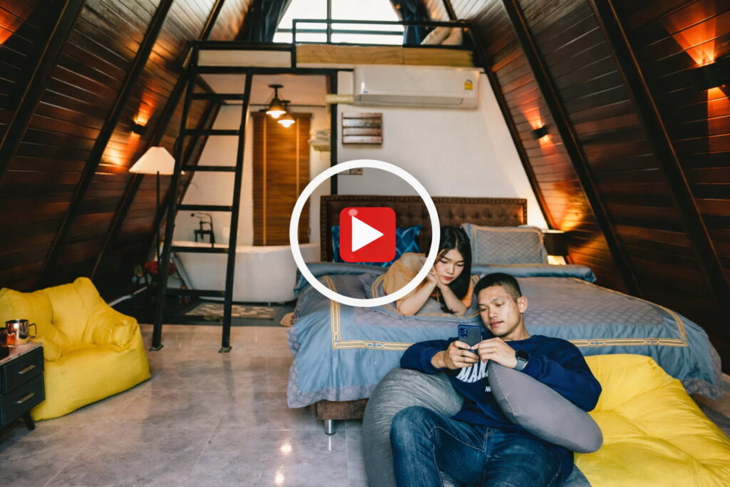 A man and his girlfriend relax in a heavenly a frame at nakara villas and glamping